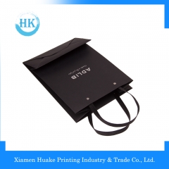 Professional cheapest shopping cheap nice looking cute black gift paper bag Huake Printing