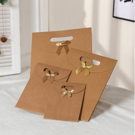 Gift Paper Bag With Bow Hand Bag Creative Flip Custom Logo Packaging Bag 